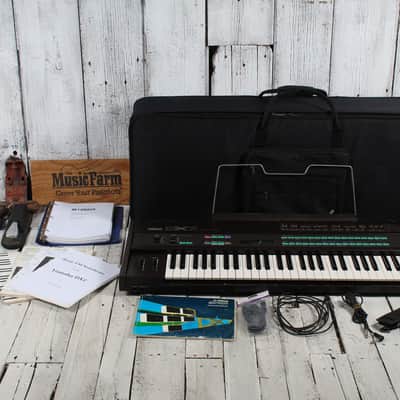 Yamaha Vintage 1980s DX7 Digital Synthesizer 61 Key Keyboard with Case & Manuals image 2
