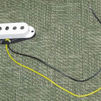 very near A+ (rarely used) genuine Fender Tex-Mex Stratocaster Bridge Single Coil Pickup, 7.4k full strength, White Cover (p/n # 50659000) +screws & rubber bushings, Alnico 5 magnets, staggered pole pieces, Polysol magnet wire, vinyl output wires image 2