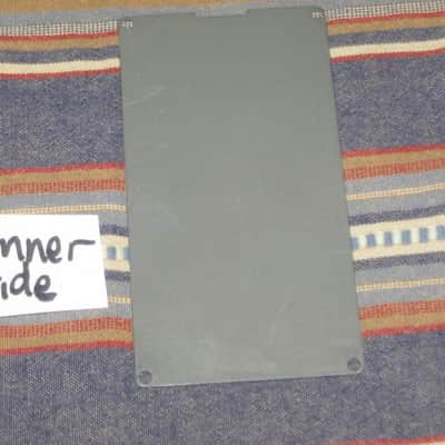 used Boss bottom plate (NO: rubber padding,label,serial number) for compact sized pedal - specifically from mid 1980s - metal, OUTER side: semi-gloss gray fiish / INNER side: flat gray finish -- back end has factory made small cut out for power jack image 3