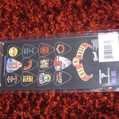new in package (old stock) A+ Perri's Leather Ltd. / Perri's 12 Pack Of Guns N Roses Guitar Picks - Med Gauge - Celluloid Plastic, 351 shape - but slightly curved (LP12-GNR1) LP12GNR1 image 13