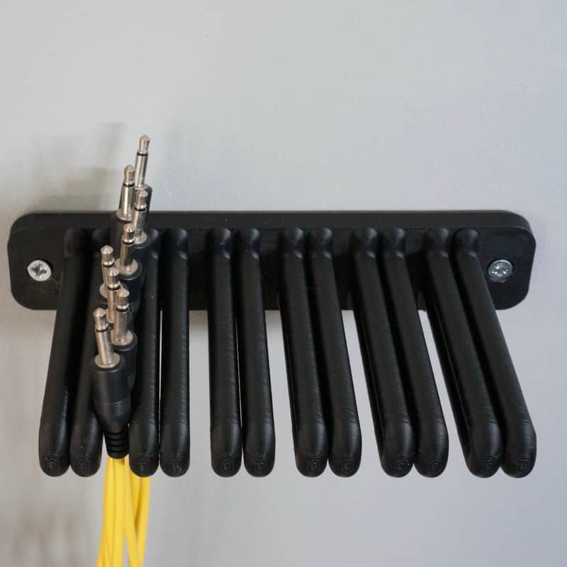 Patch Cable Holder - wall mounted - 15 cm image 1