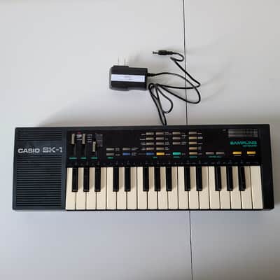 Cleaned Casio SK-1 with power adapter