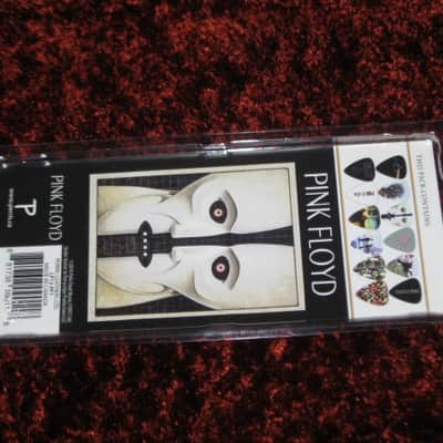 new in package (old stock) A+ Perri's Leather Ltd. / Perri's 12 Pack Of Pink Floyd Guitar Picks - Med Gauge - Celluloid Plastic, 351 shape - but slightly curved (LP12-PF1) LP12PF1 image 20