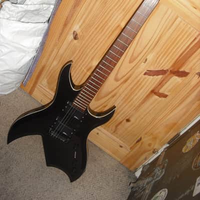 B.C. Rich Bich Special Edition electric guitar black white binding image 1