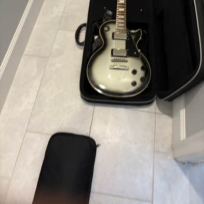 Epiphone Les Paul Custom in a Silverburst finish image 4