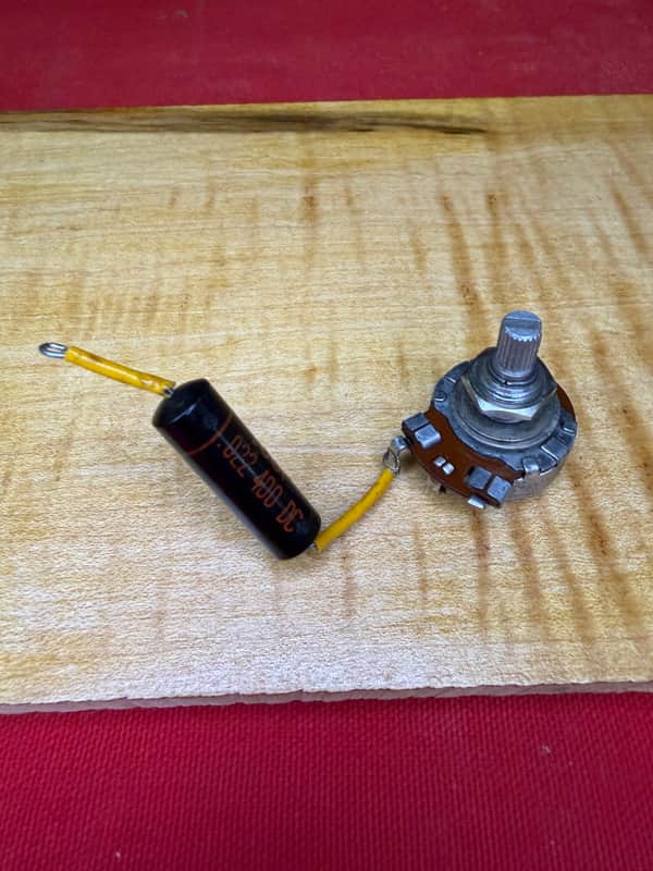Vintage Gibson Centralab 250k potentiometer with sprague black beauty 1960