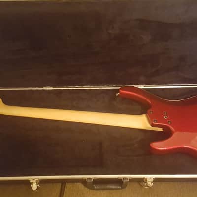 Peavey Axcelerator Series 2006 Metallic red, pearl pickguard. Comes with factory case. image 5