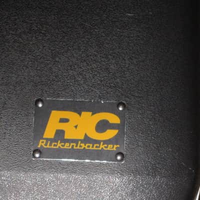 used Rickenbacker Hardshell Case for Model 620 electric guitar (NO guitar) from 1995, 2 Ball feet broke off (2 holes in plastic), Exterior plastic has some cracks,  EXT: Black Hard Plastic / Chrome HW / Handle: Black Molded Hard Plastic / INT: Blue Plush image 5
