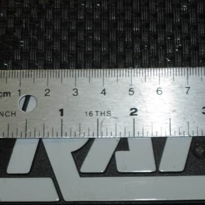 used - some imperfections genuine Crate bass amp Crate LOGO Plate (badge)- hard plastic - with 2 original screws (from a BX15 or BX25 bass amp - NO bass amp included) 1990s - early 2000s - Hard Plastic, white & black image 6