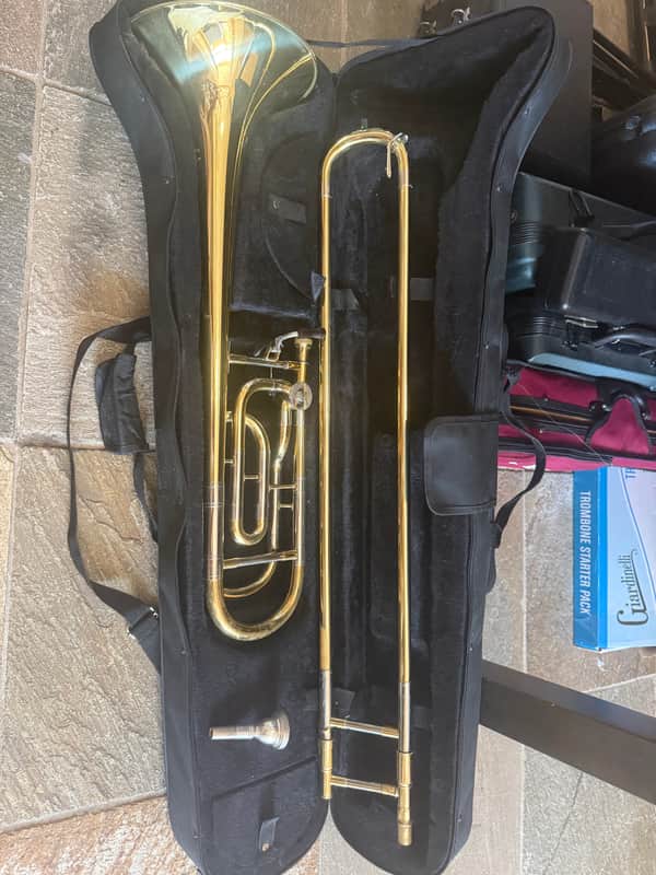 Immagine Gold color trigger trombone, With case and mouthpiece. Large bore - 1