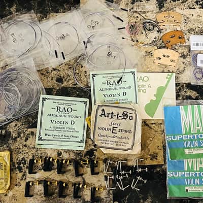 Violin fittings; bridges chin-rest, various brands of strings new and old. Project for luthier, pegs and other fittings. Sold as is. image 1
