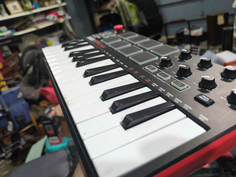 Akai MPKMini 2026 - Matte Black / Red (or, for 40 dollars extra, we do custom, professional colors and graphics under our brand umbrella - illimex studios / north corner media) image 1
