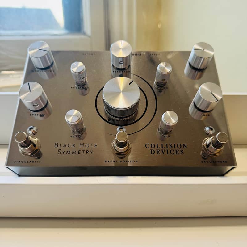 Collision Devices Black Hole Symmetry