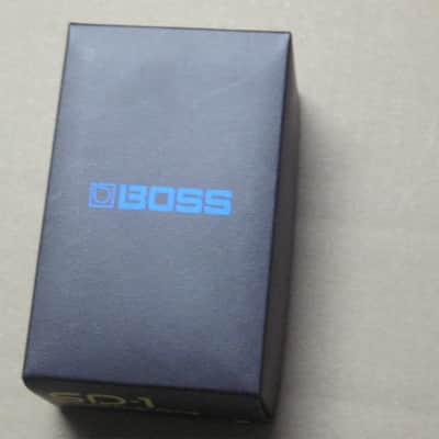 lightly handled - generally mostly very clean Boss EMPTY BOX for SD-1 SUPER OverDrive (NO pedal / NO paperwork) specifically from 2020 - but can be home for other year SD1 pedal) outside of box is black with yellow, light blue, & white graphic image 8