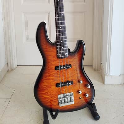 Fender Jazz Bass Deluxe Series 24 Fret MIK Korea Cherry Sunburst, Quilted Maple top.   90's Sunburst image 1