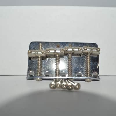 unbranded 4 string bass bridge and screws image 1