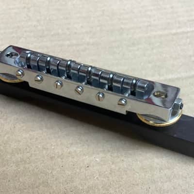 Unknown Vintage roller bridge with side screws and wooden base for guitar / archtop ? image 1