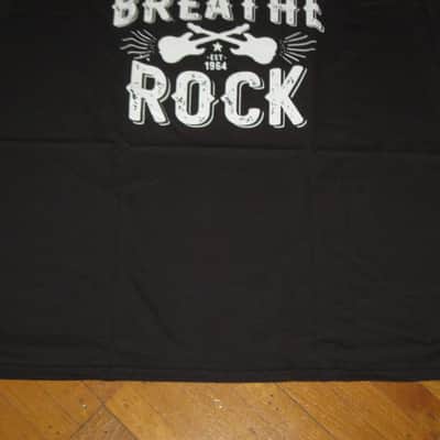 new in package A+ Guitar Center EAT BREATHE, ROCK Men's Size X-Large (XL), Black 100% Cotton Short Sleeve T-Shirt - Graphic is in White and it says / shows: GUITAR CENTER EST. 1964, EAT, BREATHE, ROCK + has dual guitars, stars, lines (Style # GC005-11730) image 8