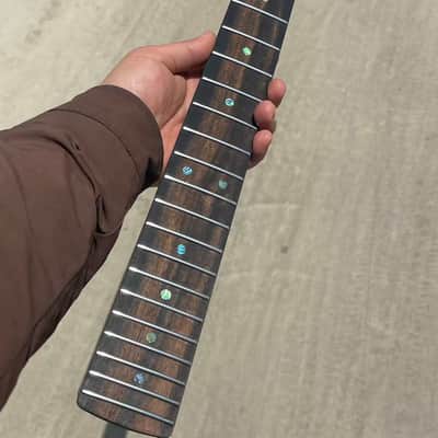 5a Striped Ebony Fretboard 22frets 5a Roasted flame Maple guitar neck Radius 12inch Round stainless steel 22 frets Roasted flame Maple guitar neck Striped Ebony fingerboard 25.5inch hole 10mm Radius: 12 inches. image 2