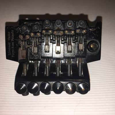 Floyd Rose licensed tremolo with adjustable saddles image 1