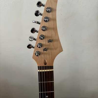 Custom Built 2026 guitar, Mahogany Body, Maple neck with laurel fingerboard. Metallic green body. Pro setup done play's great. Upgraded locking tuners, Matching Bridge image 2