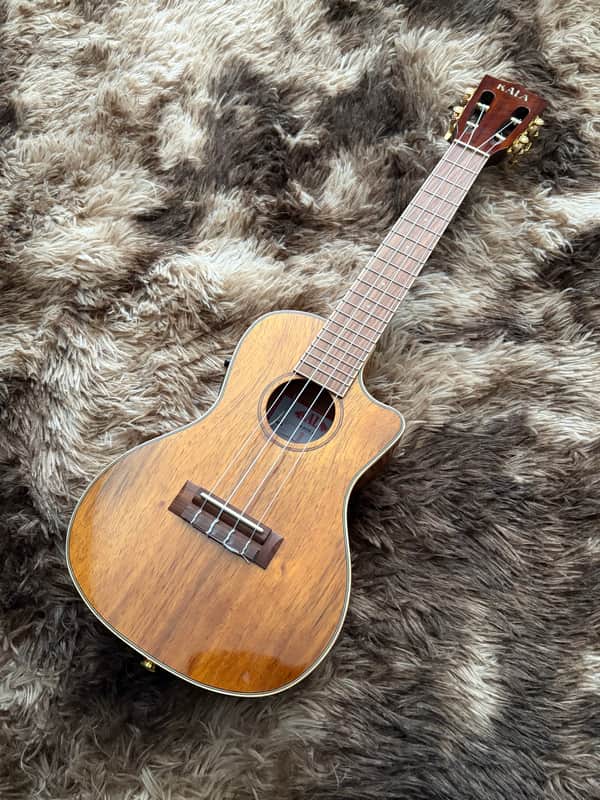 Kala KA-KCGE-C Hawaiian Koa Series Acoustic/Electric Concert Cutaway Ukulele with EQ - Gloss Natural image 1