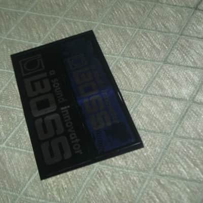 never used genuine BOSS sticker sheet (1 sheet has 2 stickers) 1) BOSS a sound innovator - colors Silver, Blue, Black Silver & 2) BOSS a sound innovator - colors Silver & Black (specifically from 1988), was orig paired w/ a DC3 Japan (pedal NOT included) image 10