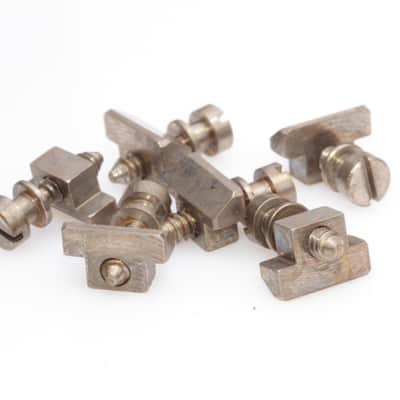 Aged ABR-1 Repl. Saddles/Screws fits Gibson® Vintage correct Soft Brass Alloy (incl.Tooling Markings)tage correct Soft Brass Alloy (incl.Tooling Markin image 1