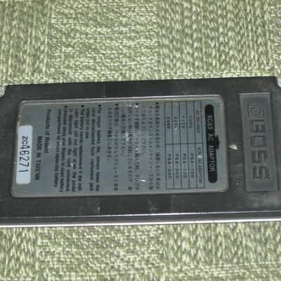 used medium relic'd genuine Boss Bottom Plate (Silver Label Taiwan) for compact (regular) size pedal, from March 1991 - PLATE PART: Metal w/ Silver Finish / BOTTOM LABEL: SLT / EXTERIOR PADDING: Black stiff hardened rubber - NO: pedal/screws/other items image 17
