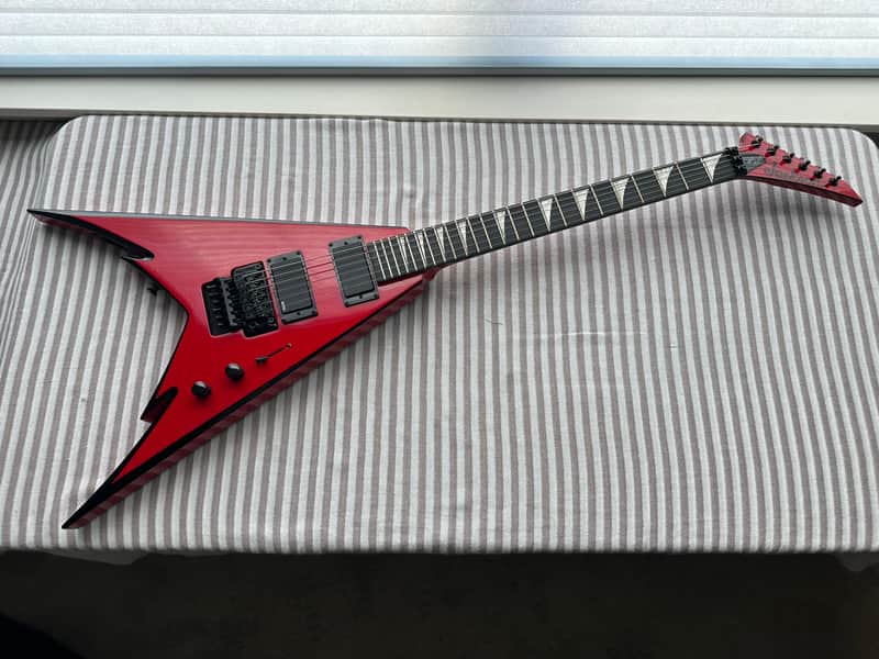 Jackson Pro Series Phil Demmel Signature Demmelition Pro King V, NOS condition, NECK-THRU construction, Floyd Rose Tremolo, Active EMG pickups, RED with BLACK BEVELS, with OEM Jackson FLYING V Hardshell Case, original accessories image 1