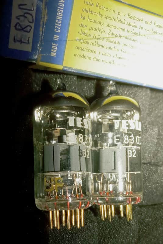 Tesla E83CC FRAME GRID GOLD PIN Likely later 70' production. Code changes have smart slueths who hope chime in with more exact year. - Premium workmanship glass bottle and gold pins image 1