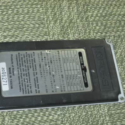 used medium relic'd genuine Boss Bottom Plate (Silver Label Taiwan) for compact (regular) size pedal, from March 1991 - PLATE PART: Metal w/ Silver Finish / BOTTOM LABEL: SLT / EXTERIOR PADDING: Black stiff hardened rubber - NO: pedal/screws/other items image 12