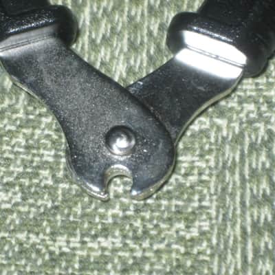new (no package) very near A+ D'Addario Planet Waves PRO-WINDER Black String Winder & Cutter & Bridge Pin Puller DP0002 for guitar, mandolin, ukulele & banjos (black hard plastic with hardened steel wire cutters) just has few minor natural imperfections image 10