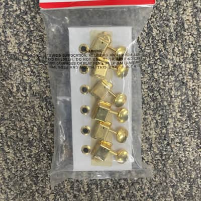 Fender Vintage set ping Gold With bushings image 1