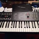 Sequential Six-Trak 49-Key 6-Voice Polyphonic Synthesizer 1984 - 1985 - Black with Wood Sides