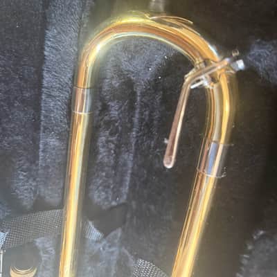 Immagine Gold color trigger trombone, With case and mouthpiece. Large bore - 11