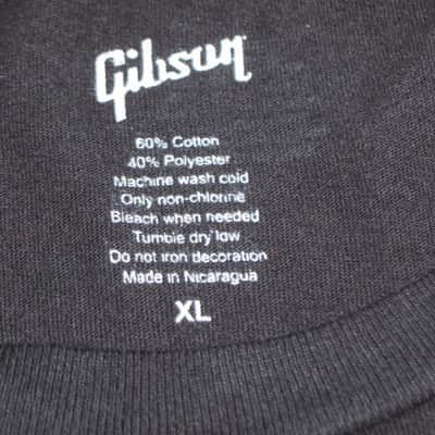 new A+ (with hang tag) genuine Gibson Firebird T-Shirt XL (X-Large), Black with Red Graphic, 60% Cotton / 40% Polyester - short sleeve GIBS-GA-FBBMXL (GA-FBBMXL) UPC # 711106533919 image 2