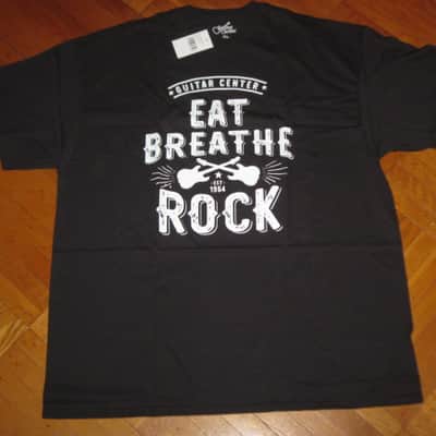 new in package A+ Guitar Center EAT BREATHE, ROCK Men's Size X-Large (XL), Black 100% Cotton Short Sleeve T-Shirt - Graphic is in White and it says / shows: GUITAR CENTER EST. 1964, EAT, BREATHE, ROCK + has dual guitars, stars, lines (Style # GC005-11730) image 6