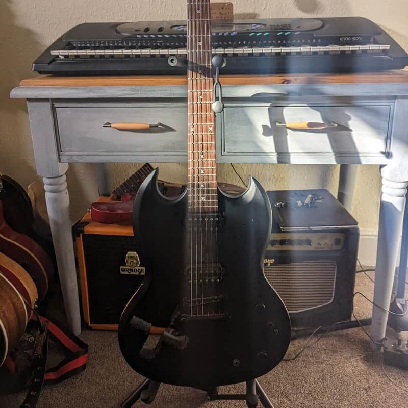 2001 – 2002 Epiphone Pierced SG Distressed Flat Black Finish