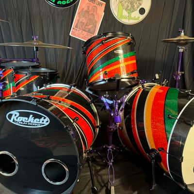 Rikki Rockett's Poison, Rockett Drum Works 2011 Tour Set. Maple/Carbon Fiber 18x22 (x2) 14.5x16, 12.5x14, 9.5x12. MultiColor Stripe Wrap image 1