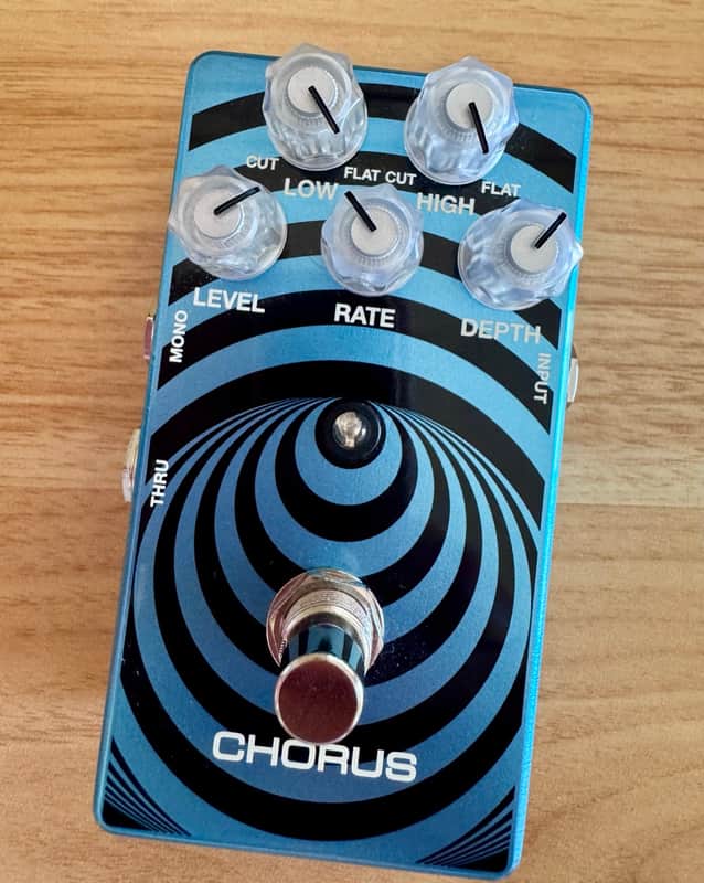 Blue chorus pedal with knobs, next to black MXR box.