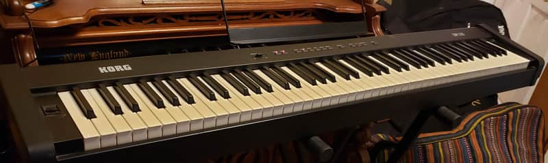 Korg SP-100 Digital Piano-88 Weighted Keys | Reverb