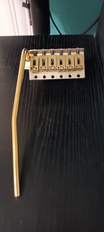 Unbranded Strat tremolo gold vintage spacing 1 piece image 1
