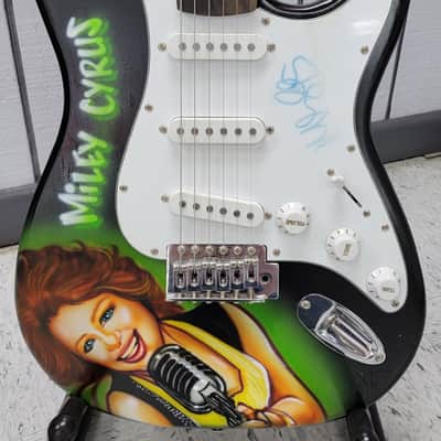 "Miley Cyrus" Autographed Guitar with "COA" image 1