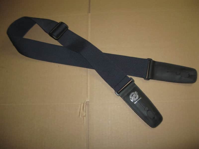 very lightly used Lock-It LIS-001-P2-BLK POLY PRO SERIES Black 2" guitar strap (2" wide, black polypropylene material, patented and brilliant Lock-It strap locking system, leather ends) straps, extend to an extra long 62" in max length image 1