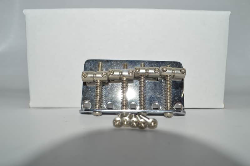 unbranded 4 string bass bridge and screws image 1