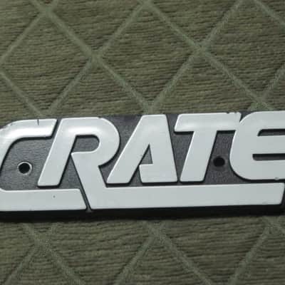 used - some imperfections genuine Crate bass amp Crate LOGO Plate (badge)- hard plastic - with 2 original screws (from a BX15 or BX25 bass amp - NO bass amp included) 1990s - early 2000s - Hard Plastic, white & black image 9