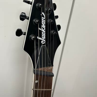 Jackson X Series SLATX7Q MS Soloist Archtop 7 String Multiscale Electric Guitar - Transparent Blue Burst image 3