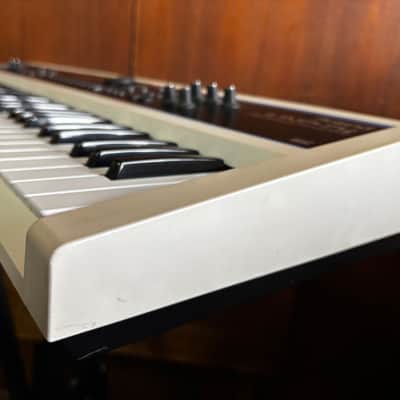 Roland Juno-Di Portable 61-key Mobile Synthesizer White color w/ bag power supply image 6