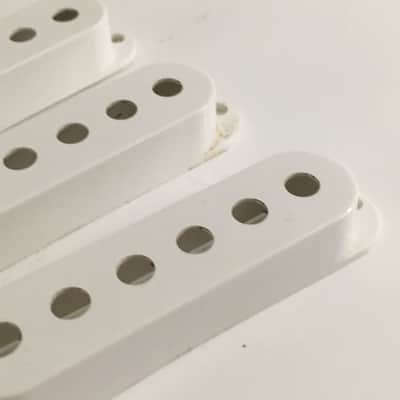 3 Genuine Fender Pure Vintage Strat Pickup Covers Electric Light NOS Relic White USA Made image 3